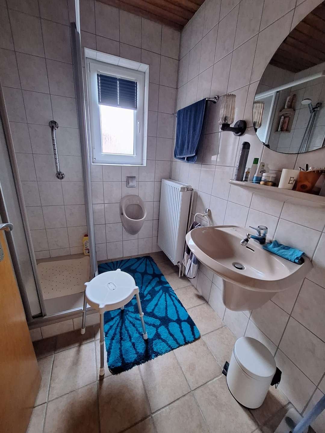 Zentrale Lage, viel Potenzial: Raumwunder mit Garten zum Verwirklichen