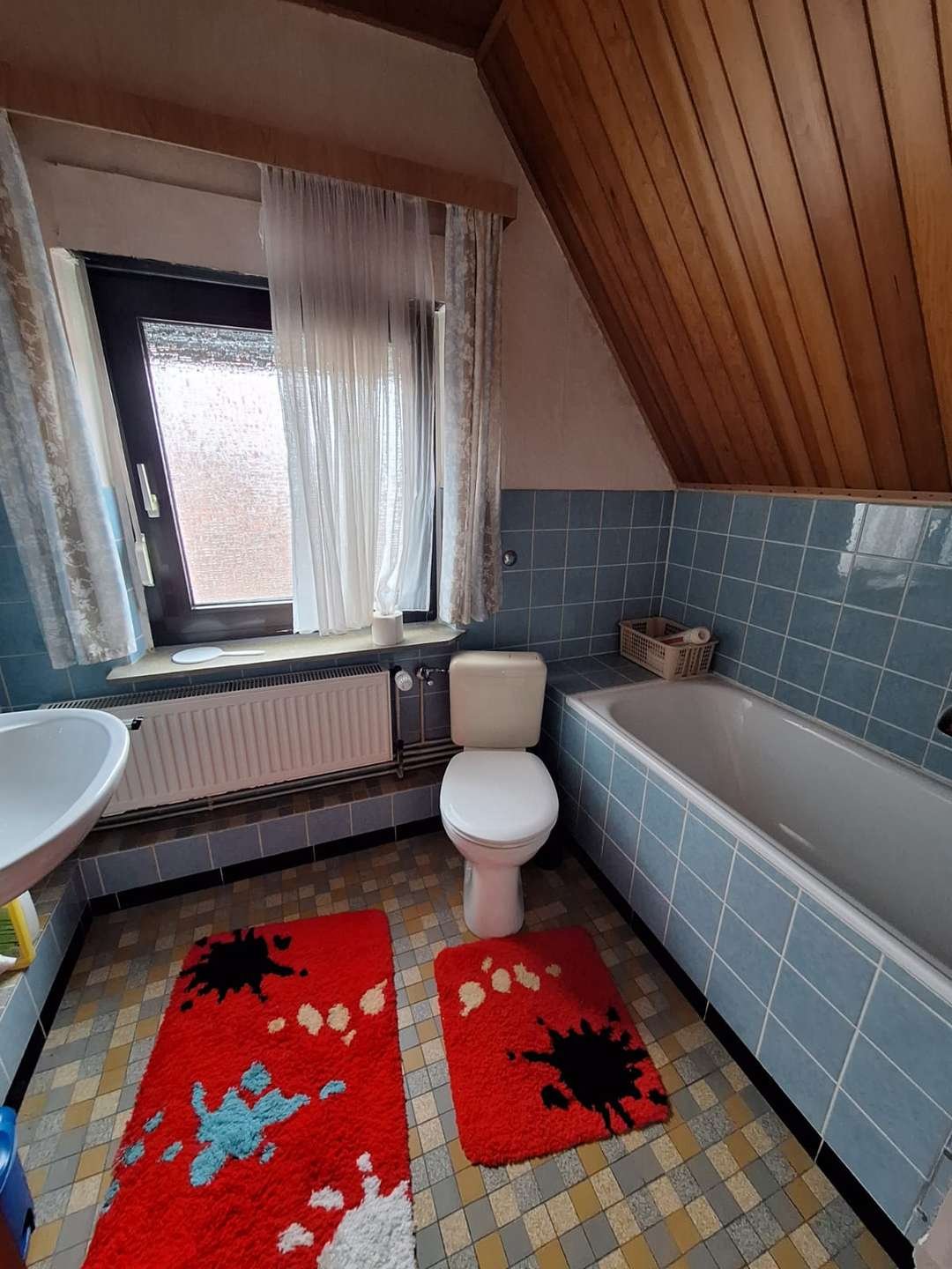 Zentrale Lage, viel Potenzial: Raumwunder mit Garten zum Verwirklichen