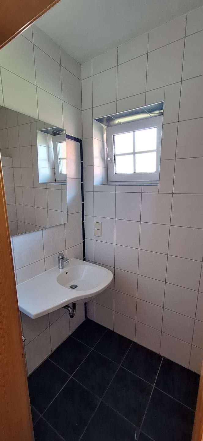 Solide Erdgeschosswohnung mit Garten und Terrasse!