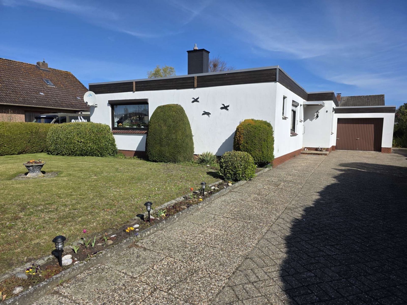Solides Flachdachhaus mit Gartenidylle in angenehmer Wohnlage