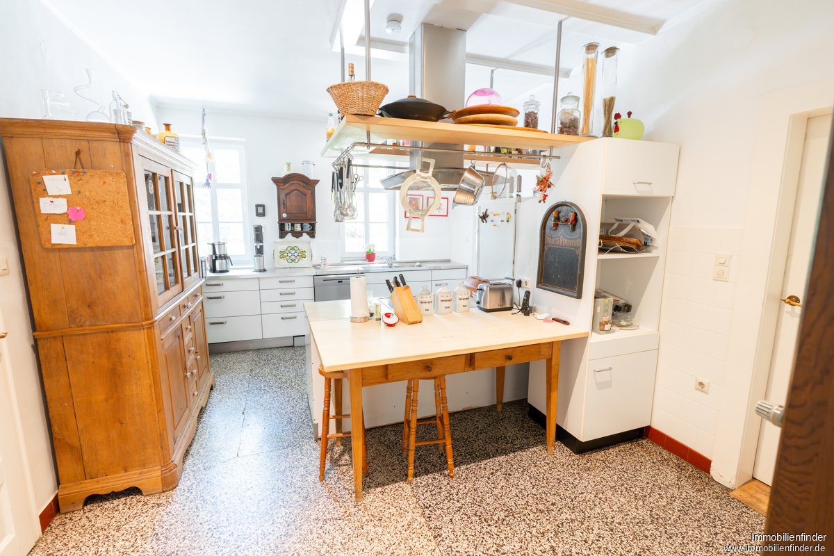 Liebenswertes Fachwerkhaus mit Remise, Streuobstwiese und Ackerfläche in Lengerich (49525)