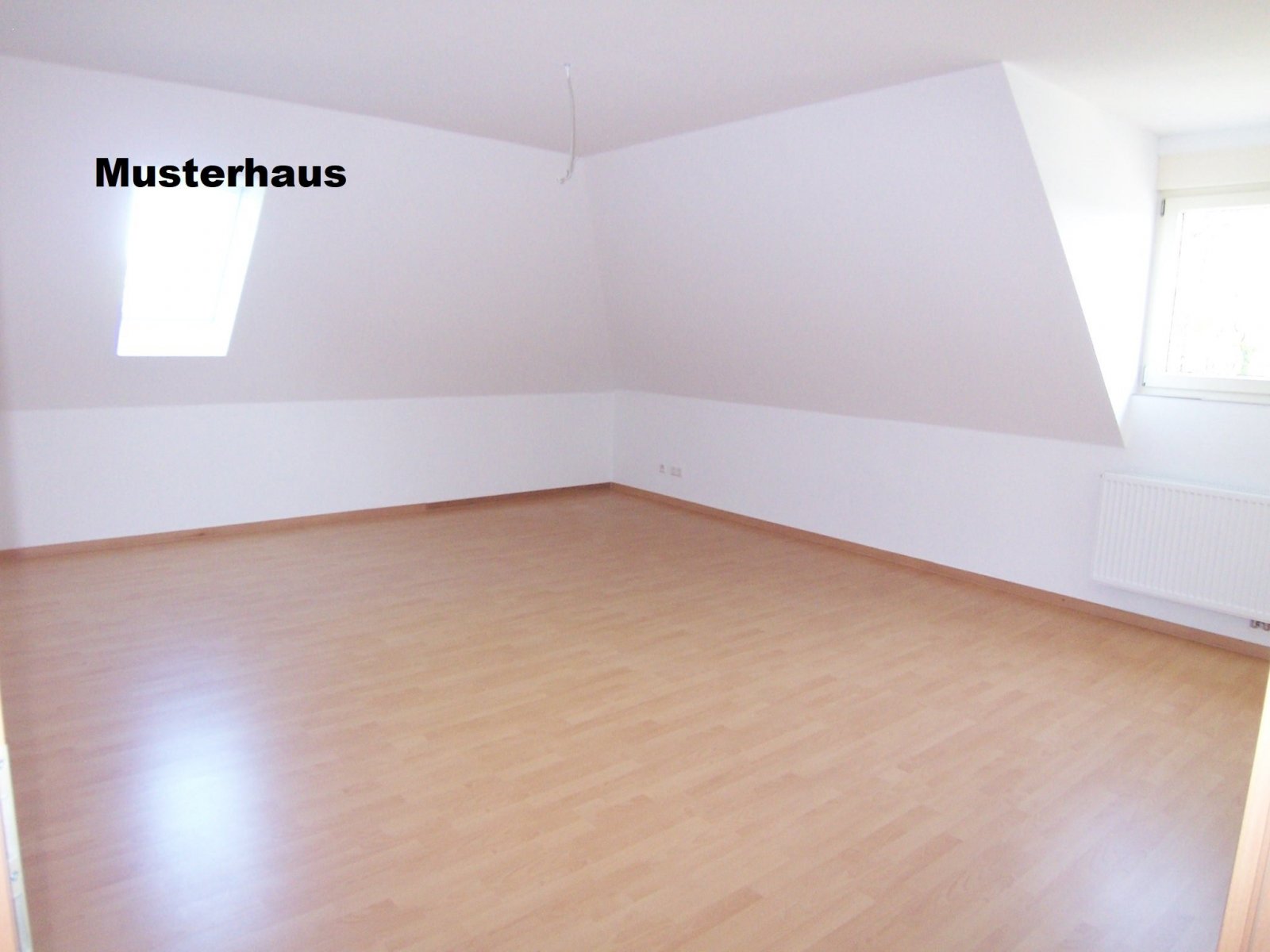 Exklusiver Neubau Winkelwalmdachbungalow in ruhiger Wohnlage