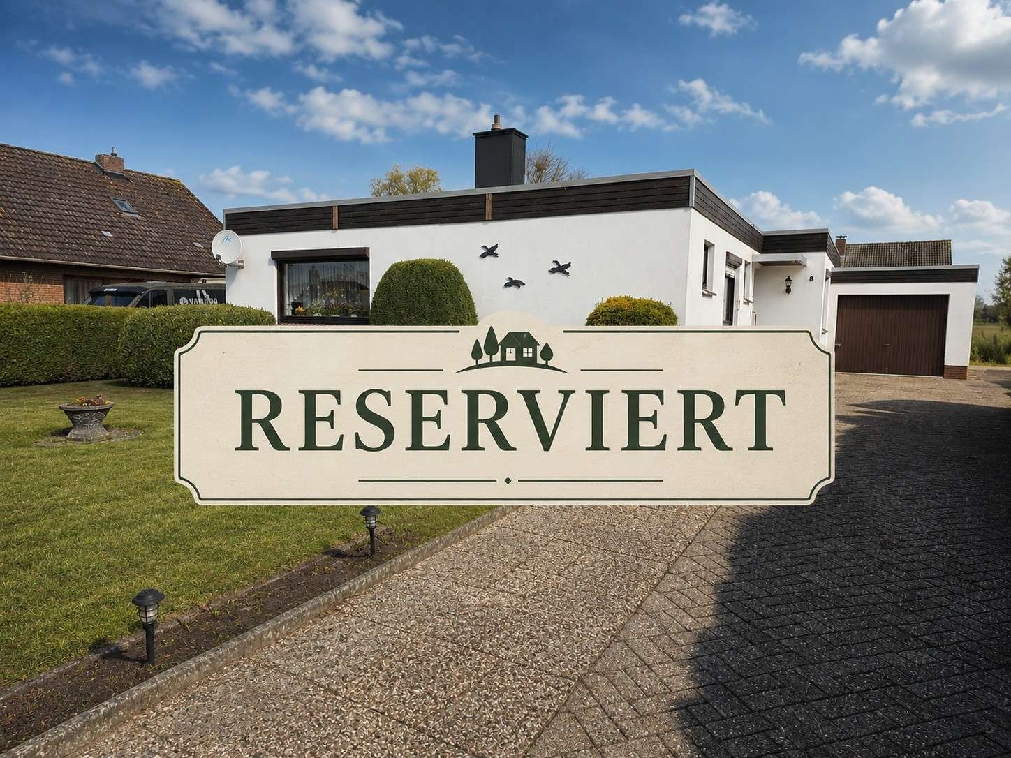 Solides Flachdachhaus mit Gartenidylle in angenehmer Wohnlage 